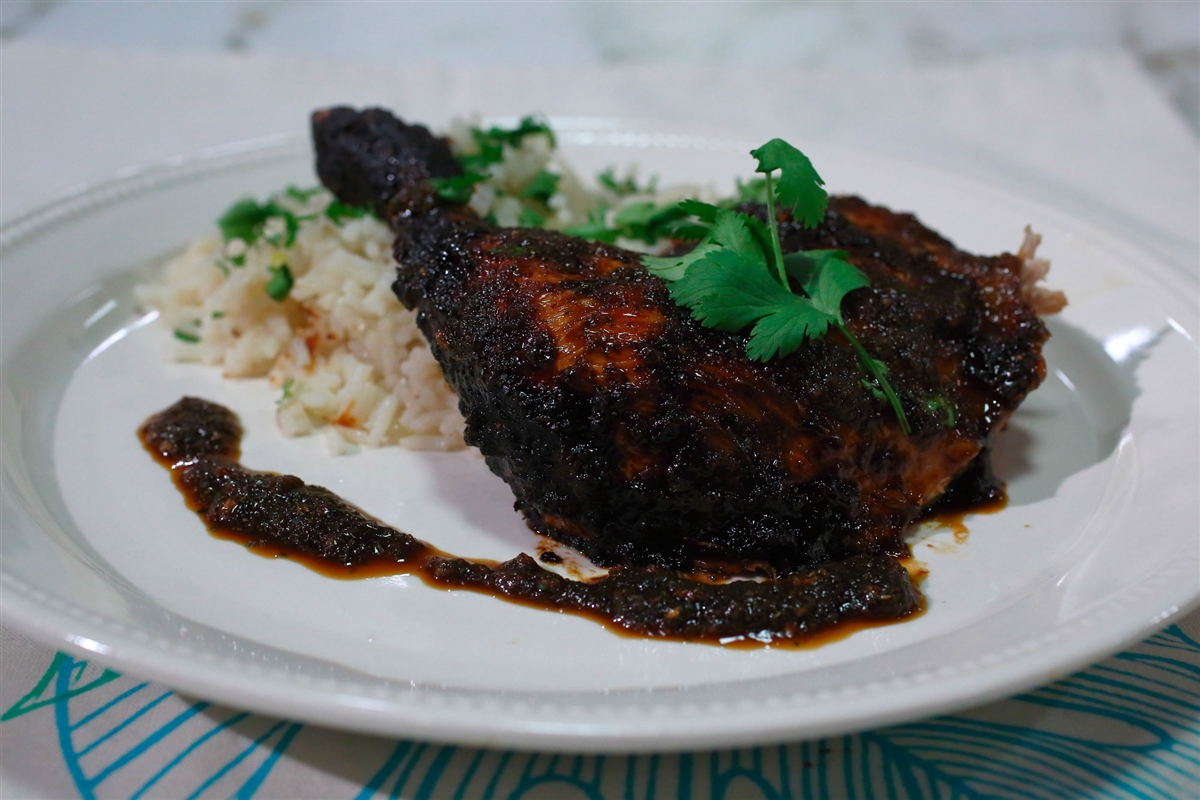 Pollo negro con arroz pilaf El Gourmet